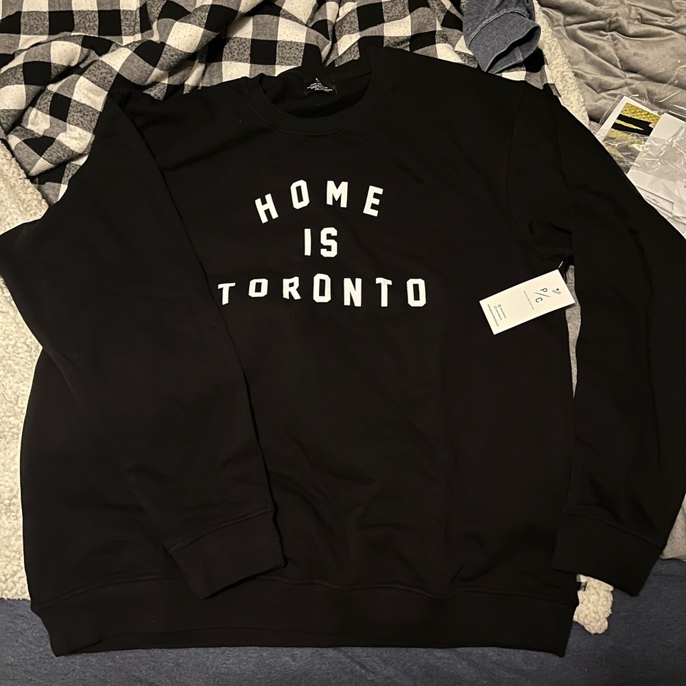 Peace collective “home is Toronto” sweater